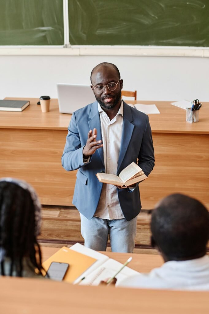 Teacher telling lecture at auditorium of university