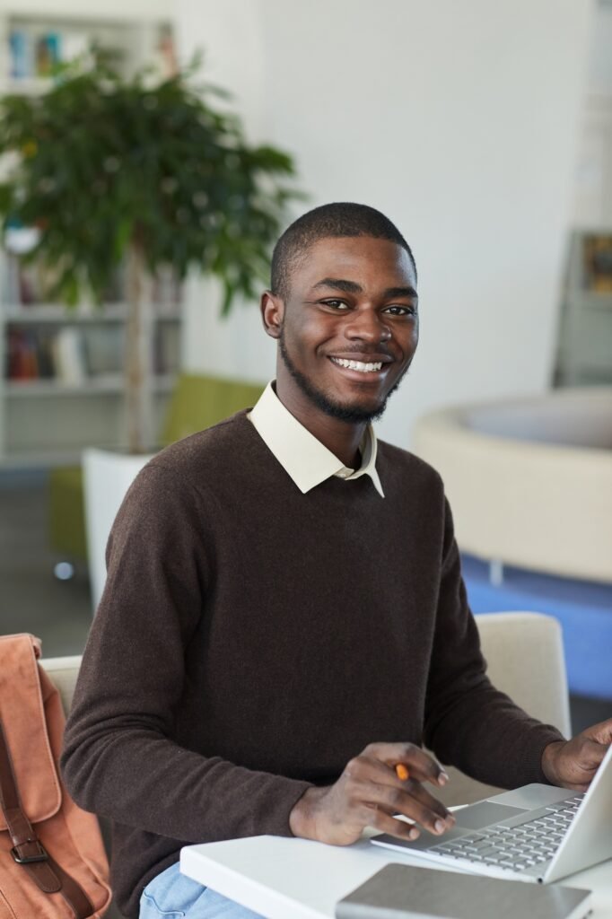 Smiling African-American Student in Library